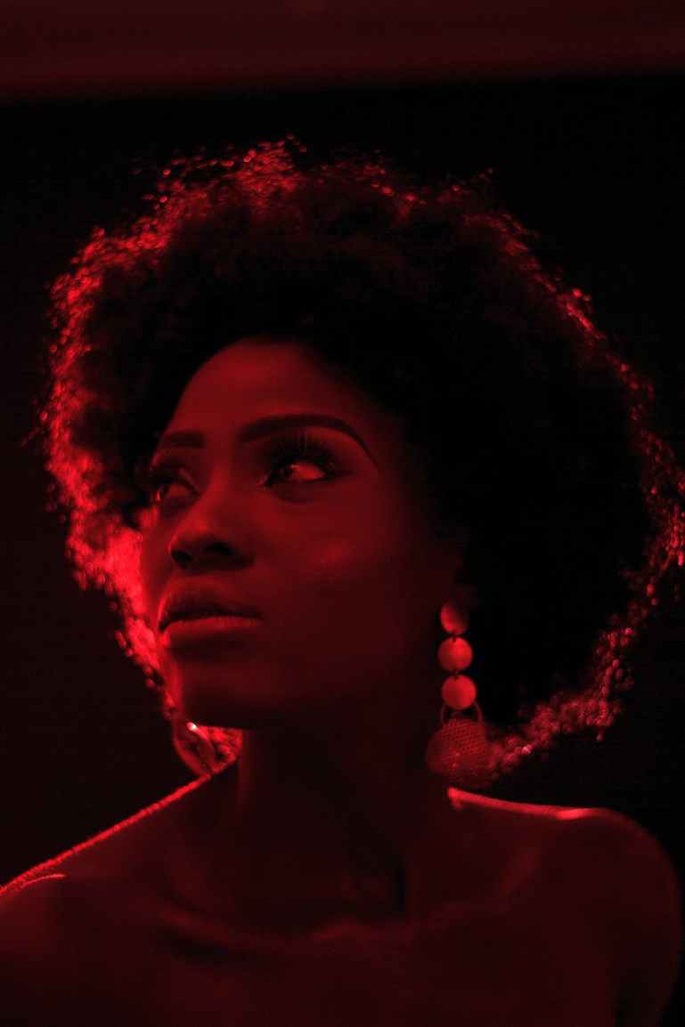 portrait photography of woman looking up