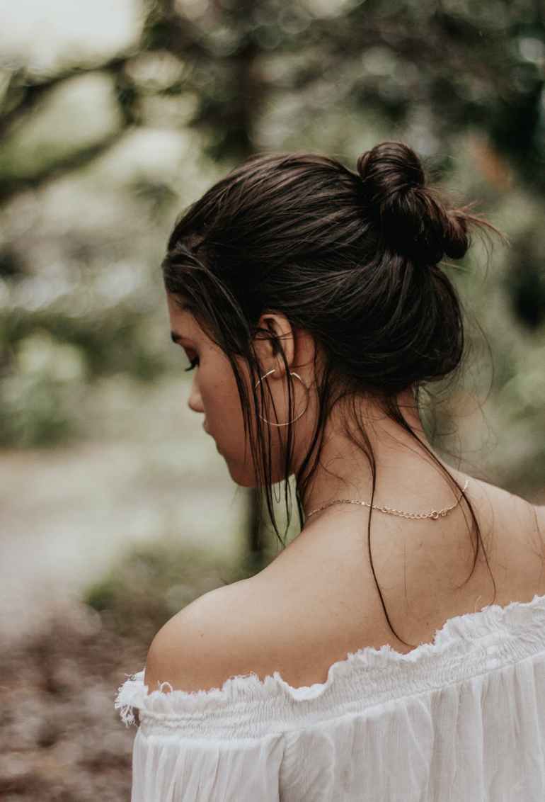 woman wearing off shoulder blouse
