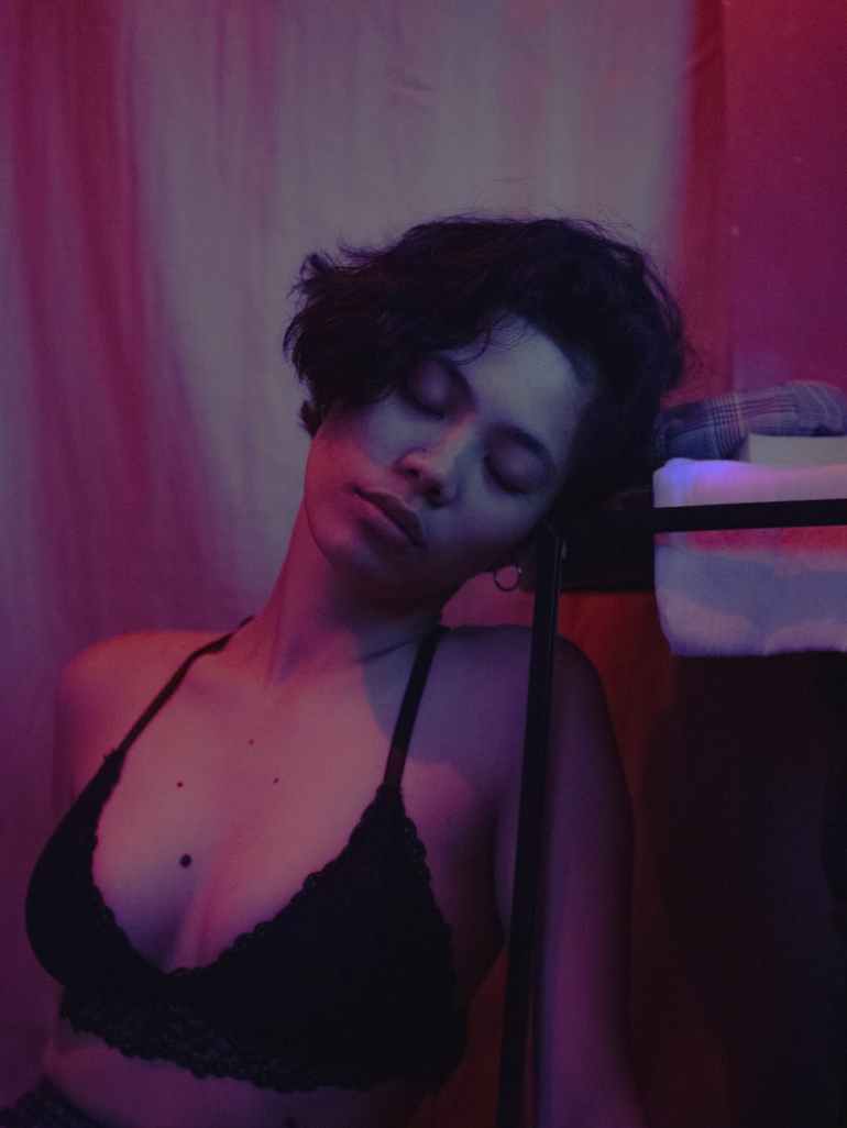 woman in black bra inside room