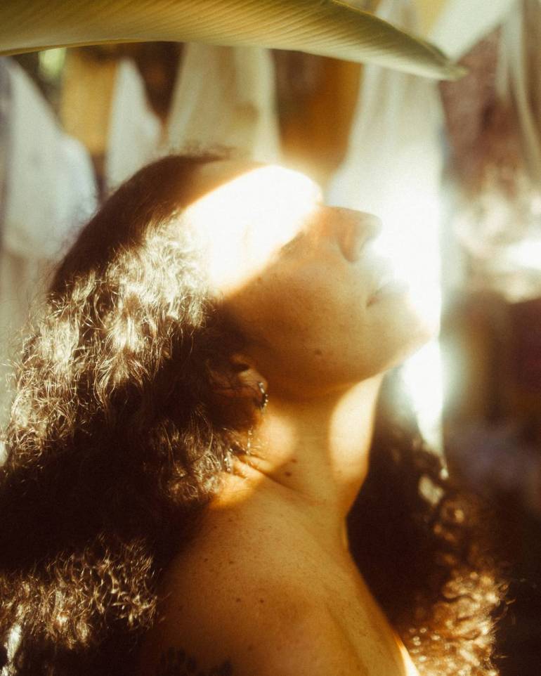 woman with sunlight on her face